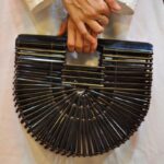 Designer Black Ark Bag - Elegant Resin Strip Clutch with Unique Open-Structure Design