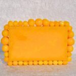 Elegant Yellow Beaded Clutch with 75 Resin Beads, Marble-Like Texture & Detachable Handle