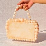 Elegant Off White Beaded Clutch with 75 Resin Beads, Marble-Like Texture & Detachable Handle