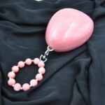 Elegant Pink Egg-Shaped Resin Clutch with Detachable Beaded Wrist Handle & Chain Strap