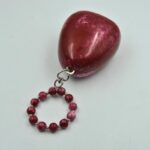 Elegant Red Egg-Shaped Resin Clutch with Detachable Beaded Wrist Handle & Chain Strap