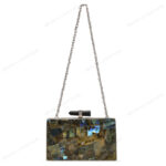 Full view of Natural labradorite gemstone clutch with quartz crystal knob and silver brass frame and strap