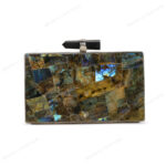 Front view of Natural labradorite gemstone clutch with quartz crystal knob and silver brass frame