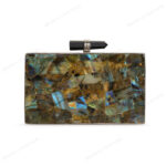 Front view of Natural labradorite gemstone clutch with quartz crystal knob and silver brass frame