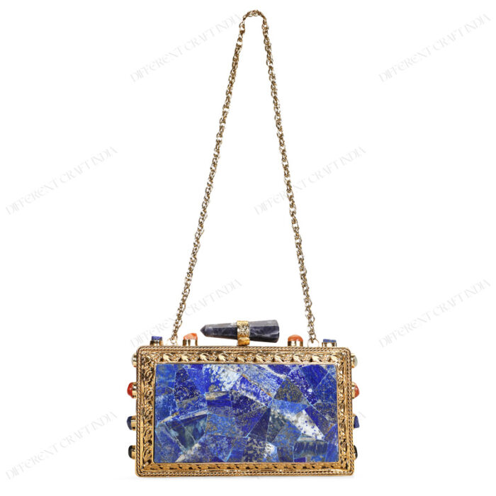 Rare lapis lazuli gemstone handbag with side-adorned gold frame and quartz crystal knob