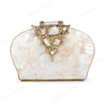 Front view of White Half-Moon Mother-of-Pearl Clutch Purse with Gold Gemstone-Embellished Triangular