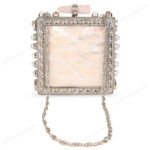 Front view of White Mother-of-Pearl Purse with Gemstone-Adorned Square Silver Frame, strap chain and Floral Border