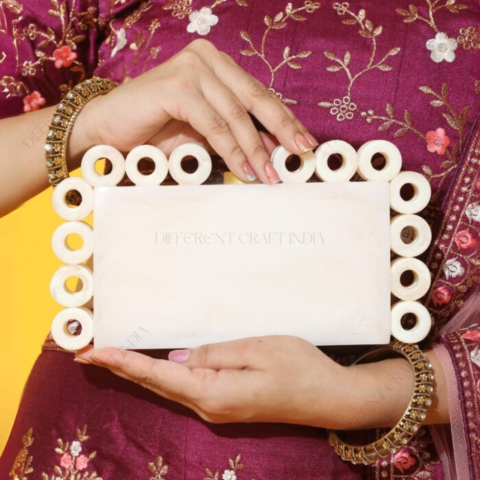 Stylish White Resin Ring Clutch with Marble-Like Finish, Adorned with 24 Exquisite Rings