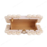 Stylish White Resin Ring Clutch with Marble-Like Finish, Adorned with 24 Exquisite Rings