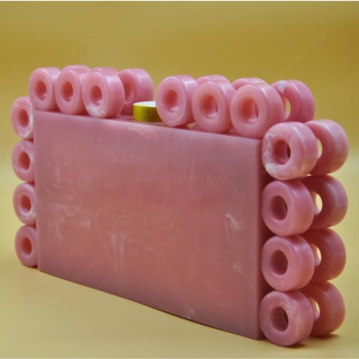 Stylish Resin Pink Ring Clutch with Marble-Like Finish, Adorned with 24 Exquisite Rings