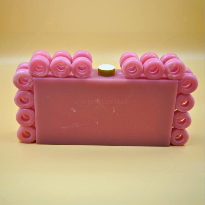 Stylish Resin Pink Ring Clutch with Marble-Like Finish, Adorned with 24 Exquisite Rings