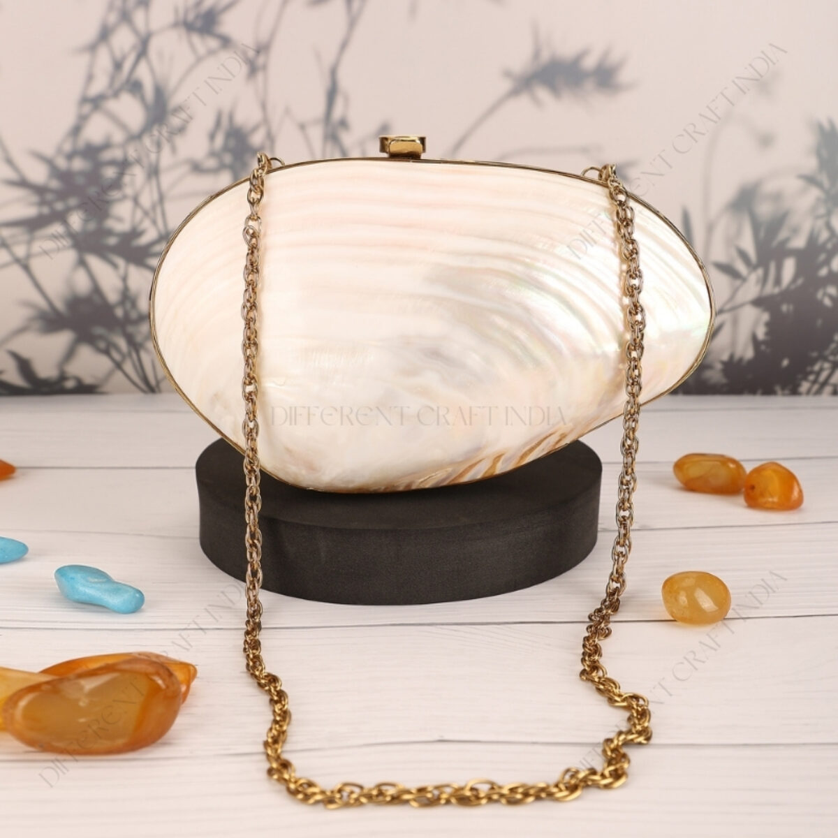 Designer Pearl Clam Shell Handbag with Elegant Gold Hand Strap