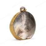 Side view of Mini Iridescent Double-Sided Round Black-Lip Oyster Seashell Bag with Gold Frame