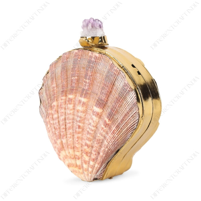 Angle view of Mini Natural Lion's Paw Scallop Seashell Clutch with Amethyst Knob and smooth Gold Frame