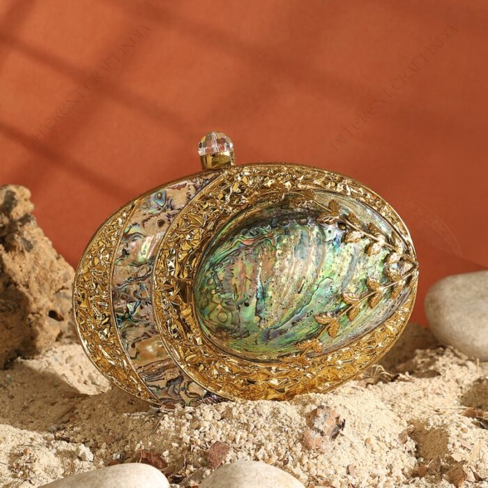 Front view of Gold Floral Emabellished Iridescent Clutch Shell with Golden Leaves on the Abalone Seashell