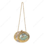 Full view of Gold Floral Embellished Iridescent Clutch Shell with Golden strap chain