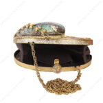 Open viewd of Gold Floral Embellished Iridescent Clutch Shell showcasing suede lining, knob and chain strap