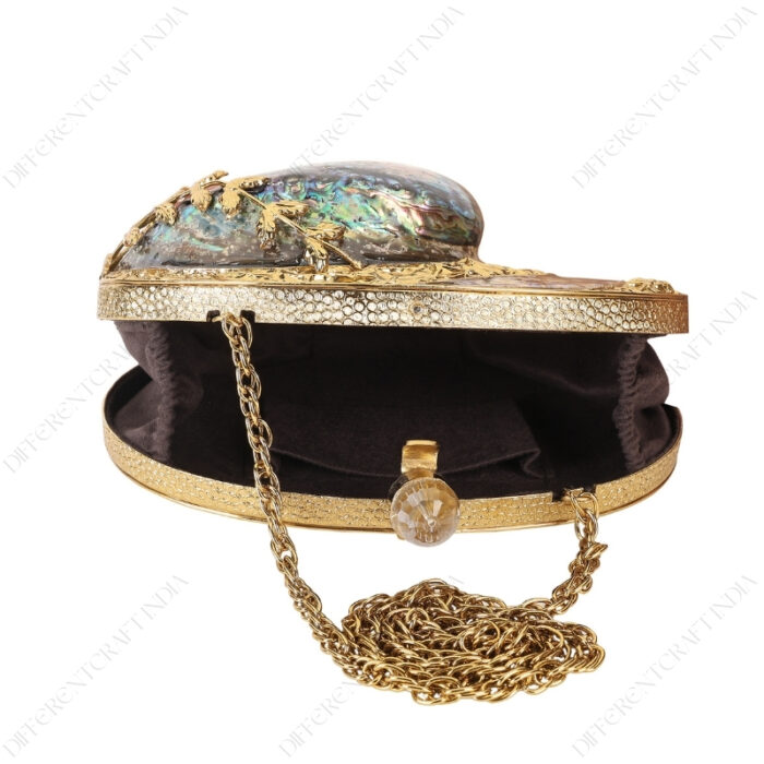 Open viewd of Gold Floral Embellished Iridescent Clutch Shell showcasing suede lining, knob and chain strap