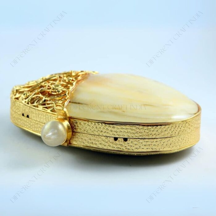 Angle view of decorative pearl knob with a small slit for easy opening Clam Seashell Evening Bag