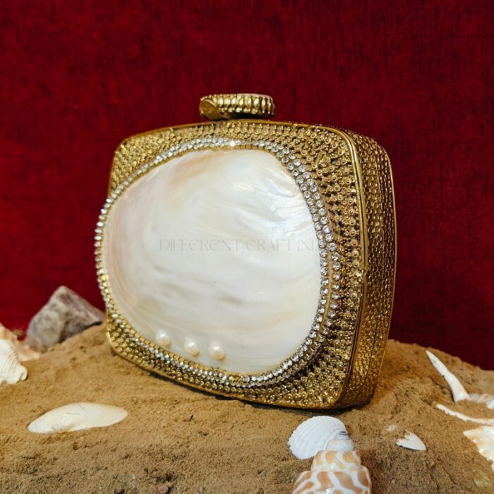 Angle view of Gold-Pattern Embellished Handbag Shell with Tiny Rhinestones Along the Clam Seashell Edges