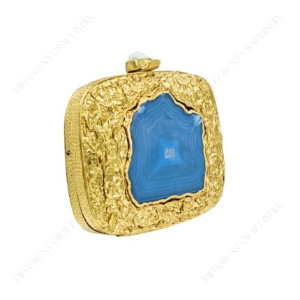 Angle view of Crumpled Gold Metal Handbag with Bold Blue Agate Stone and Unique Gemstone Clasp