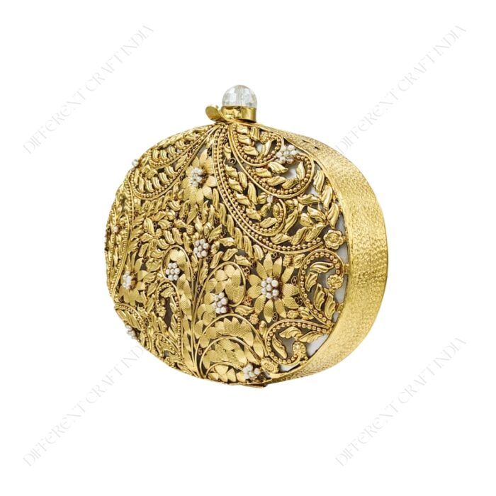 Angle view of Gold Floral Clutch Adorned with Filigree and Pearl Accents on Mother-of-Pearl