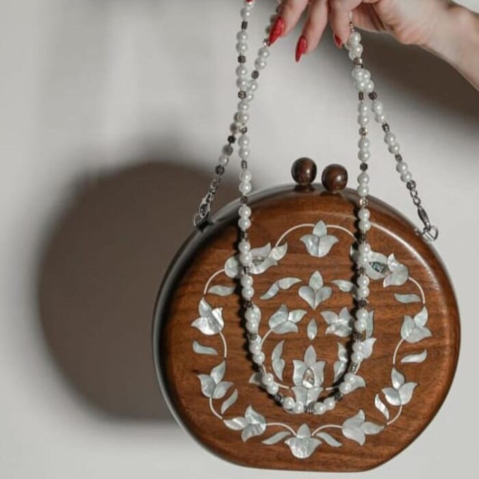 Handcrafted Round Wood Bag with Floral Mother-of-Pearl Inlay and Dual Wooden Knobs