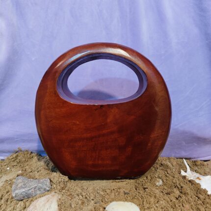 Handcrafted Round Wooden Bag with Integrated Top Handle and a Polished Natural Finish