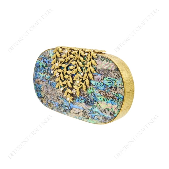 Angle view of Abalone Mother-of-Pearl Clutch with Ornate Gold-Tone Floral Clasp and Pearl Accents