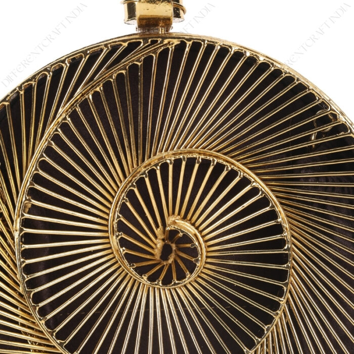 Closeup of Transparent 3D Spiral Gold Metal Clutch with Unique Cage Closure