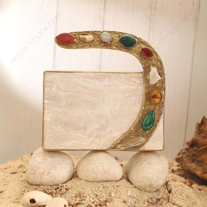 Front view of White Mother-of-Pearl Clutch with Colorful Gemstone-Studded Gold-Tone Curved Handle