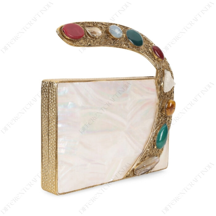 Angle view of White Mother-of-Pearl Clutch with Colorful Gemstone-Studded Gold-Tone Curved Handle