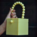 Yellow Resin Box Clutch with Unique Beaded Handle, Perfect for Hand Carry with Pearl Knob