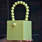 Yellow Resin Box Clutch with Unique Beaded Handle, Perfect for Hand Carry with Pearl Knob